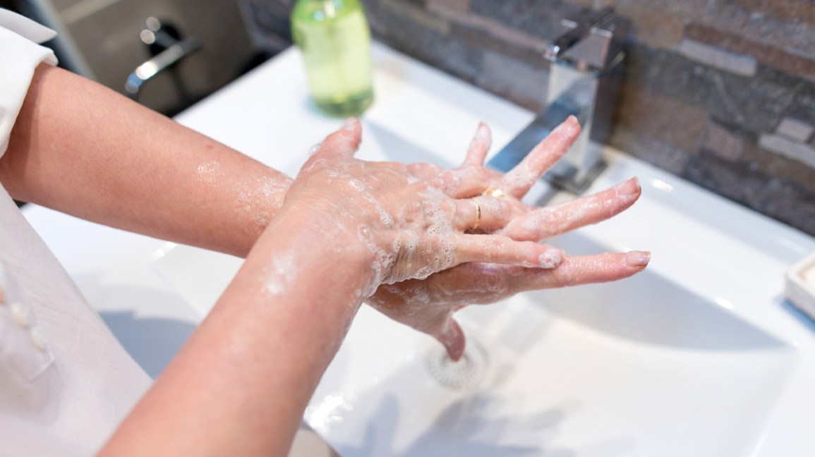 Close-up-of-woman-washing-her-hands-with-soap-1296x728-header